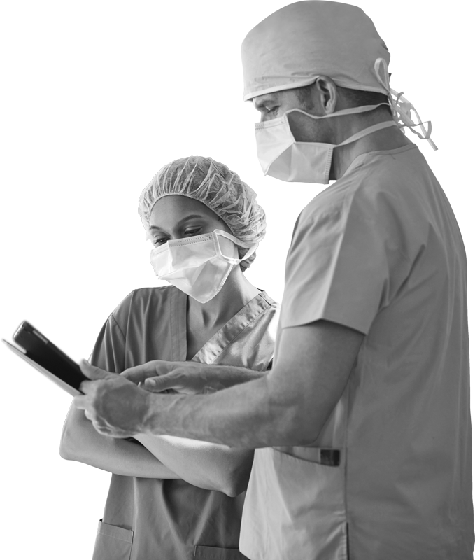 male surgeon showing female surgeon chart notes